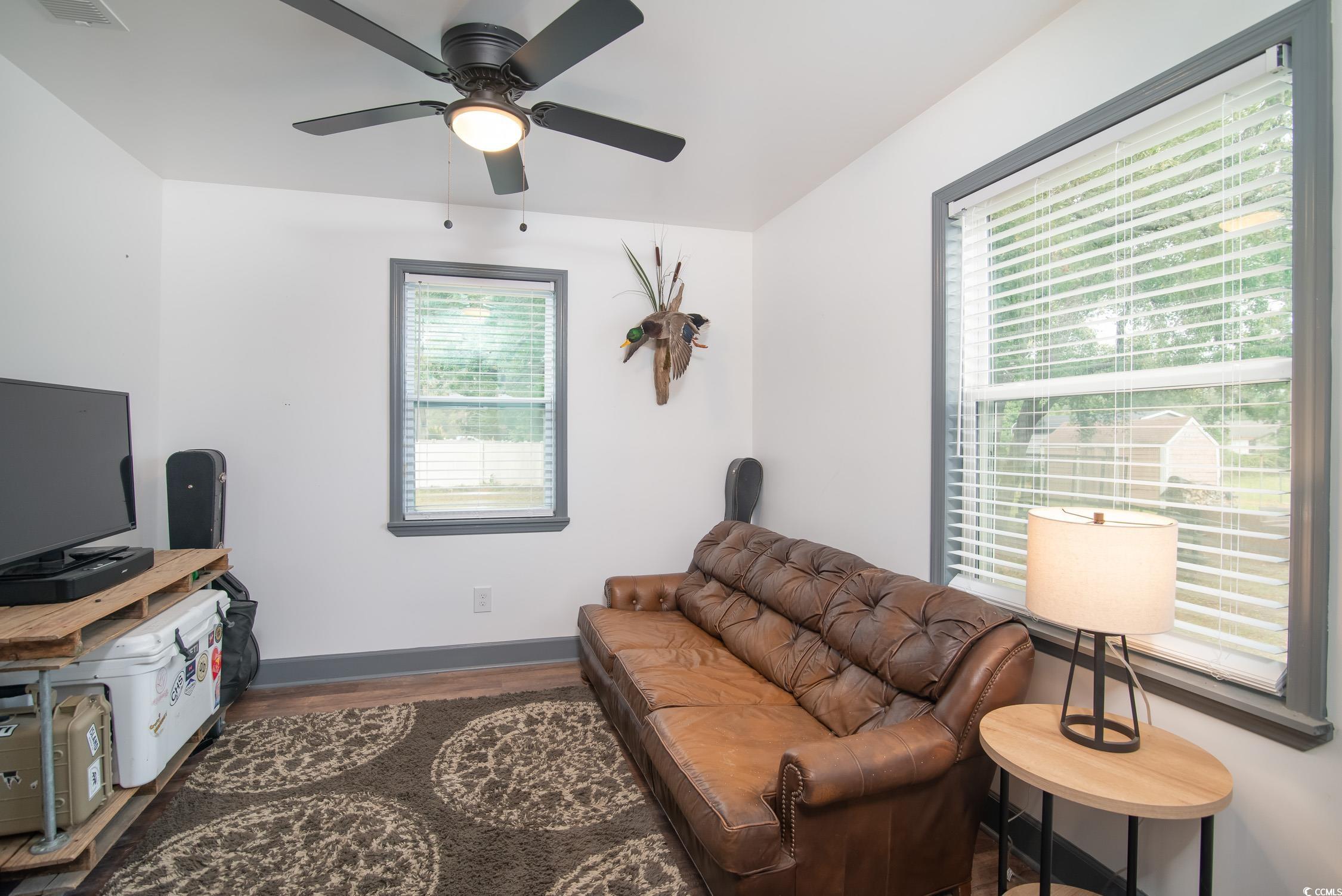 1714 Oak Street Georgetown, SC 29440 - Photo 21 of 40 Living room with a wealth of natural light, wood-t