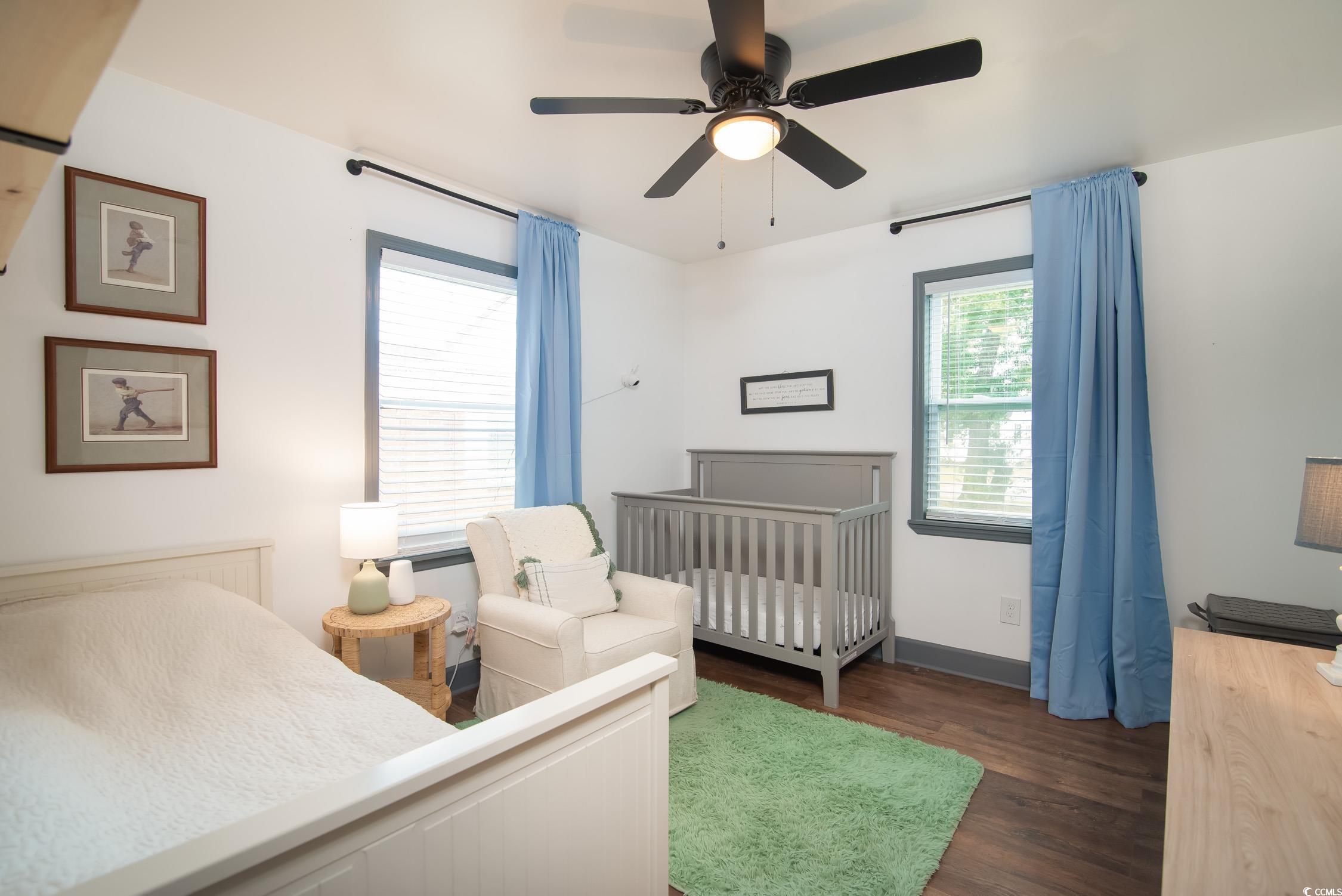 1714 Oak Street Georgetown, SC 29440 - Photo 23 of 40 Bedroom with dark hardwood / wood-style flooring,