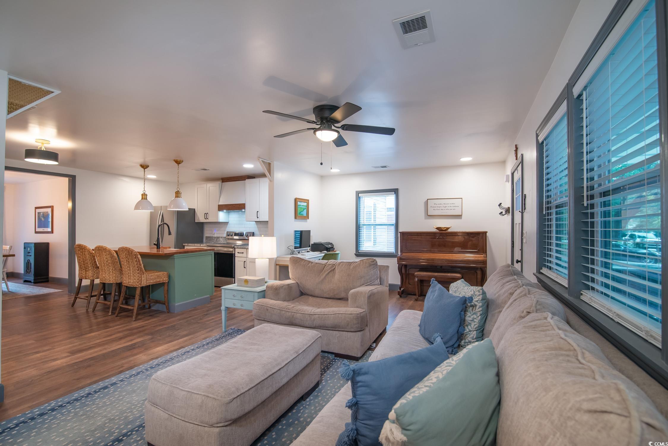 1714 Oak Street Georgetown, SC 29440 - Photo 7 of 40 Living room featuring ceiling fan and hardwood / w