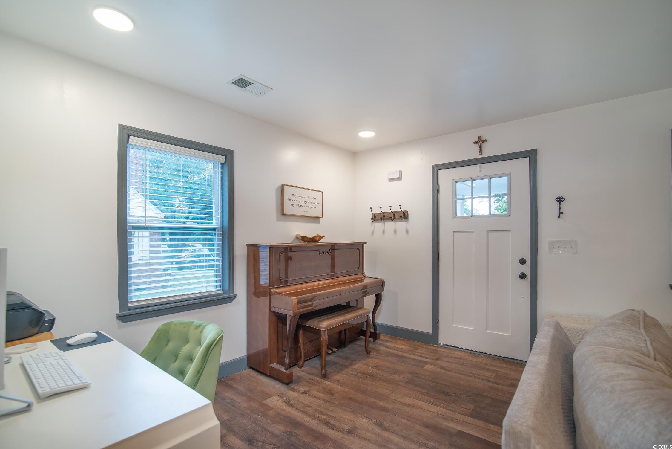 1714 Oak Street Georgetown, SC 29440 - Photo 10 of 40 Entryway featuring dark wood-type flooring and ple