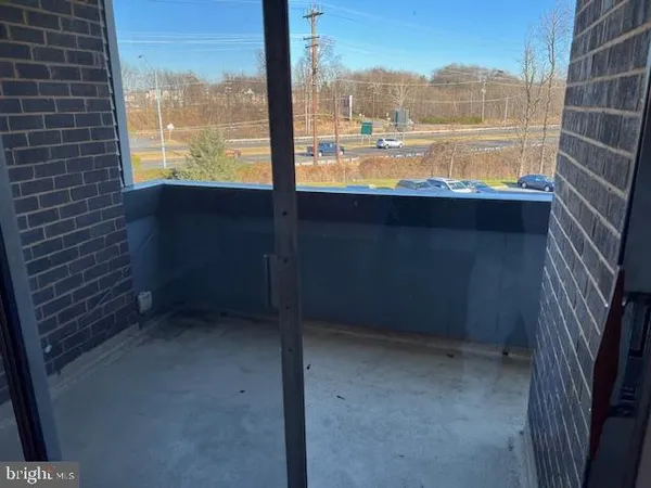 a view of a room next to a yard