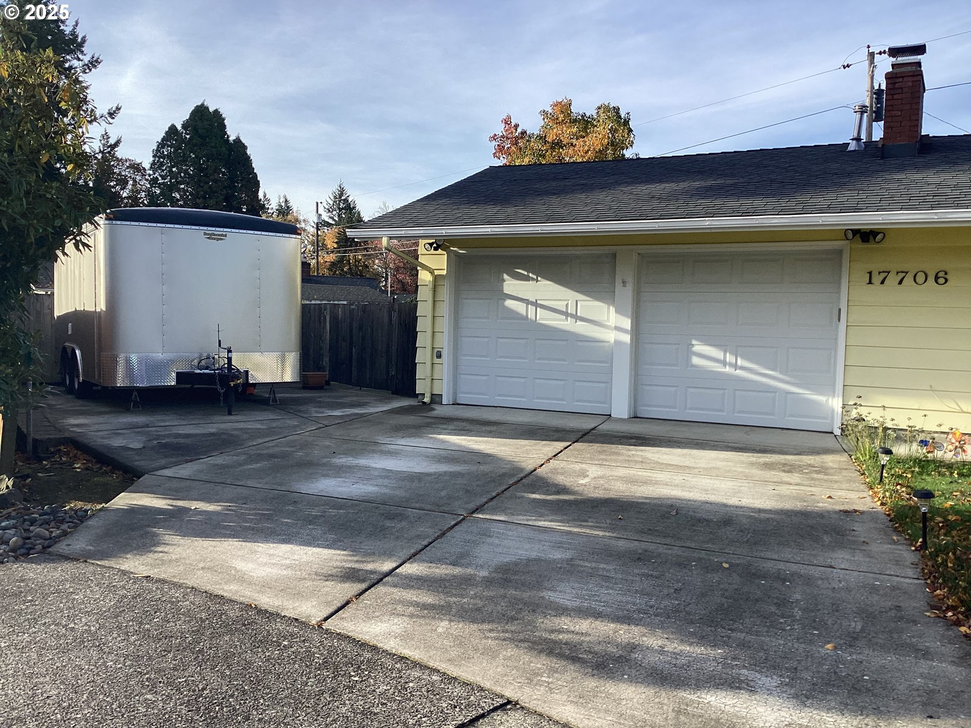 17706 Southeast Washington Street Portland, OR 97233 - Photo 2 of 34 a view of a garage door