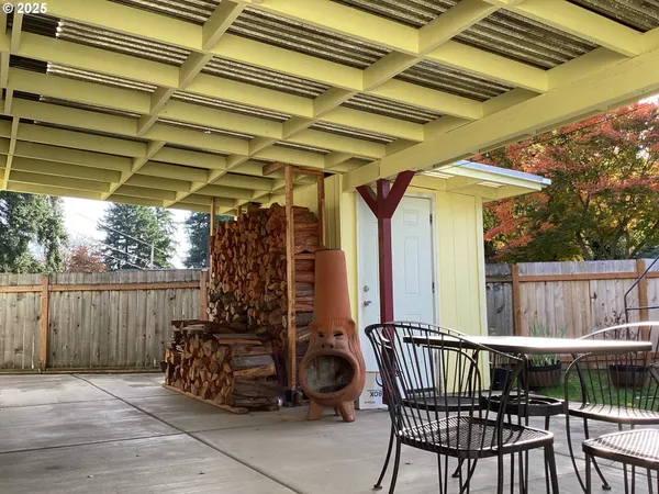 a view of chair and table in the patio