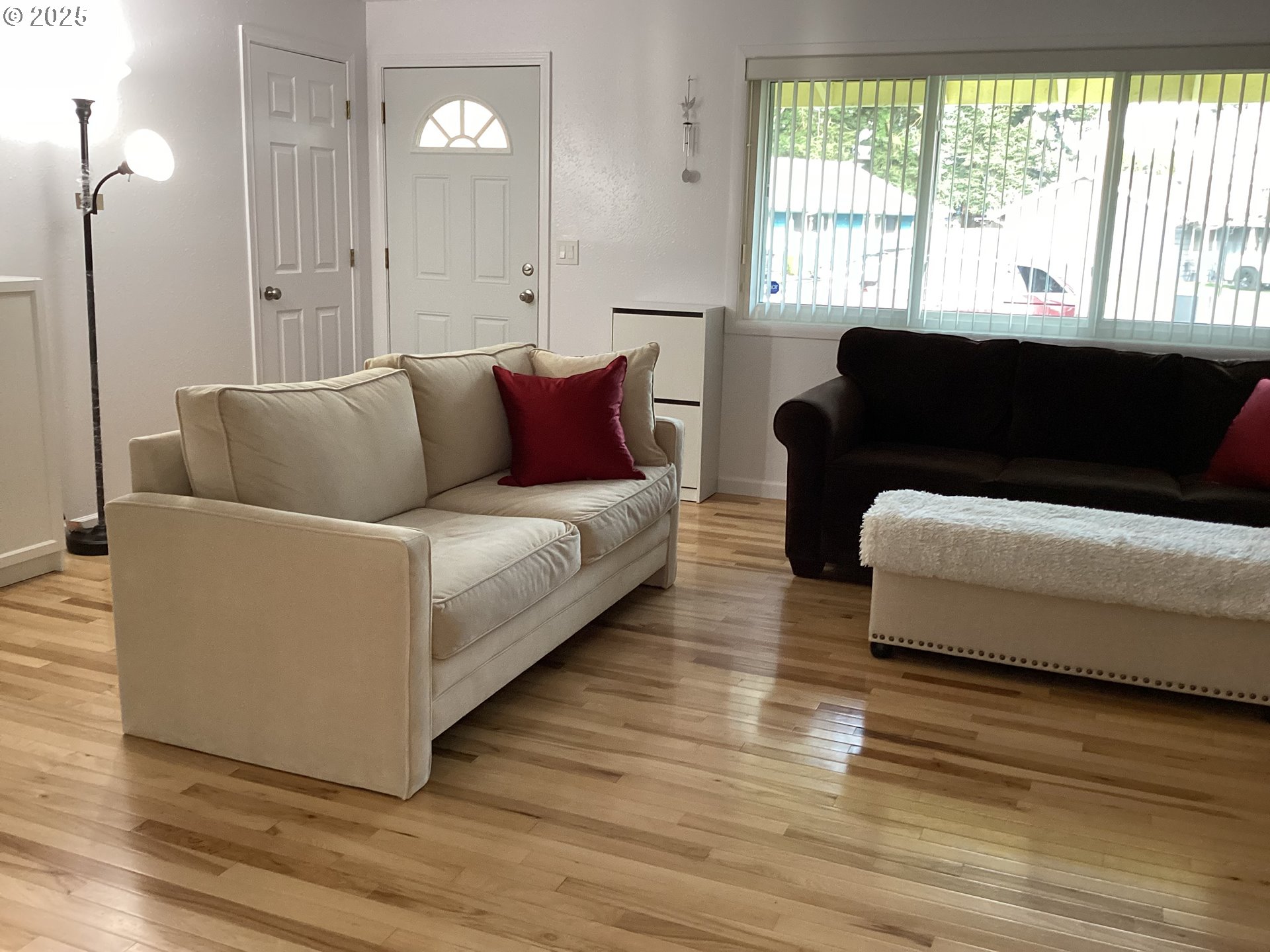 17706 Southeast Washington Street Portland, OR 97233 - Photo 5 of 34 a living room with furniture and a large window
