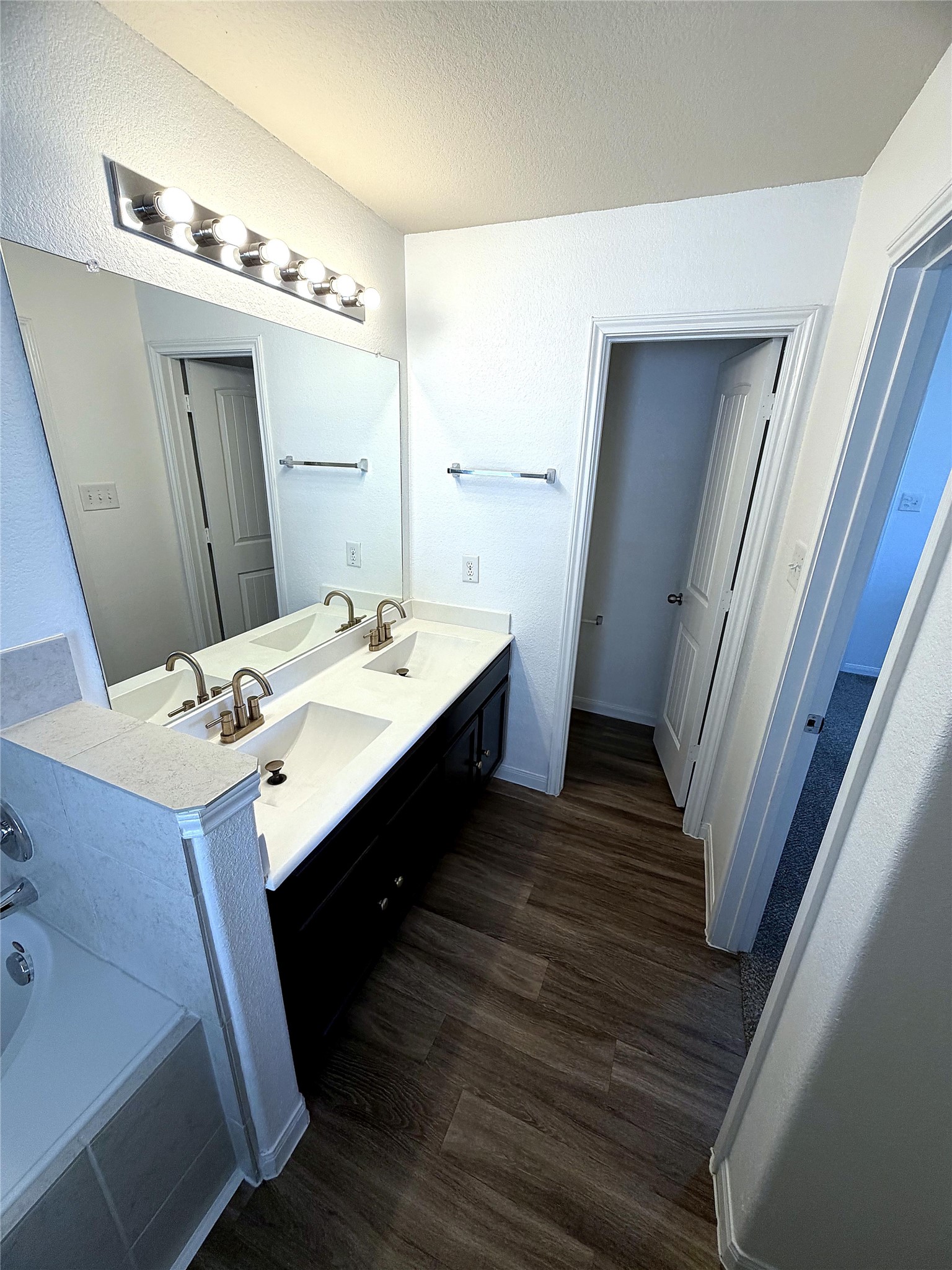 18623 Dingo Stream Lane Katy, TX 77449 - Photo 18 of 29 a bathroom with a sink a mirror and vanity