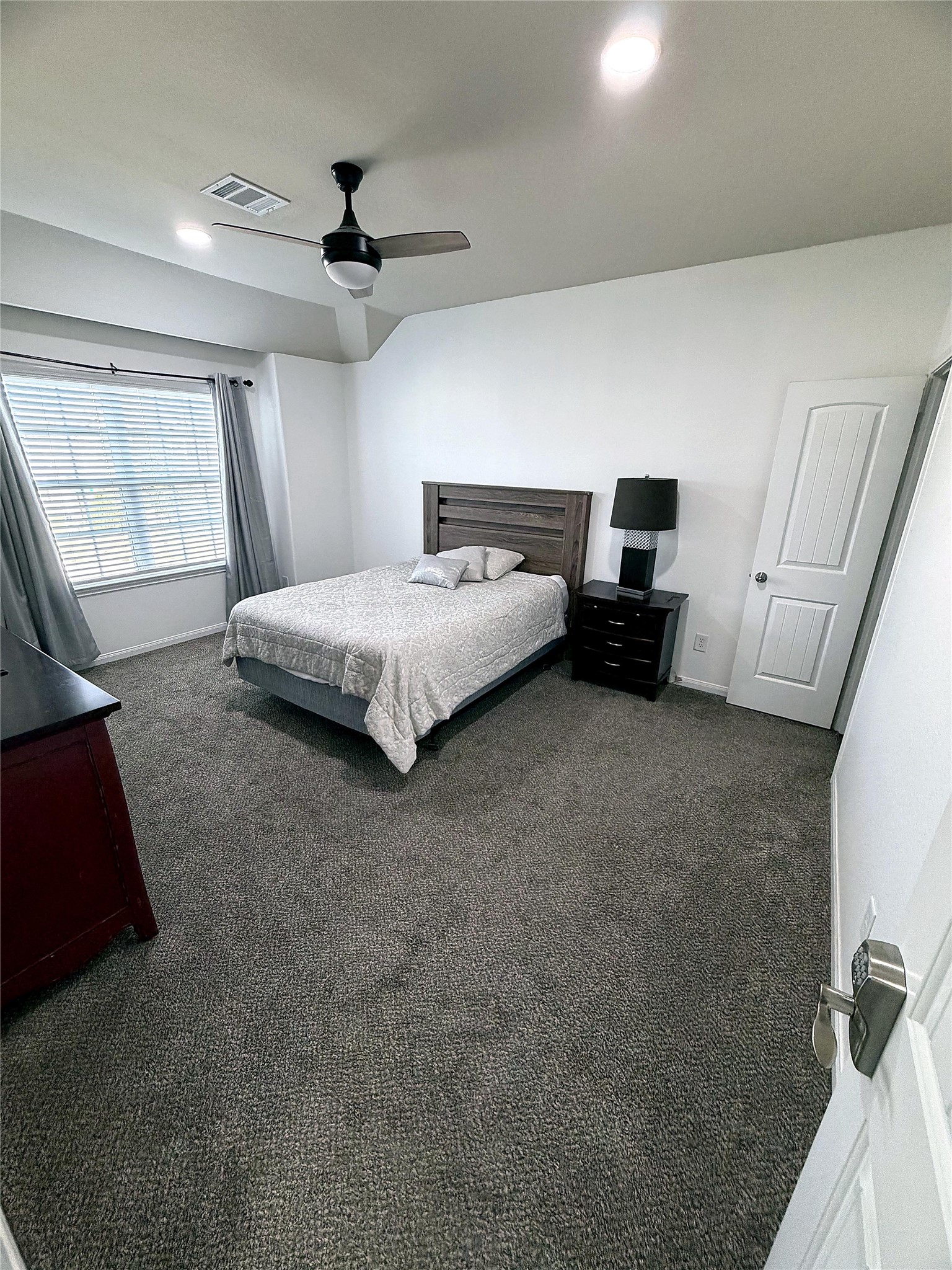 18623 Dingo Stream Lane Katy, TX 77449 - Photo 20 of 29 a bed room with a bed and a couch