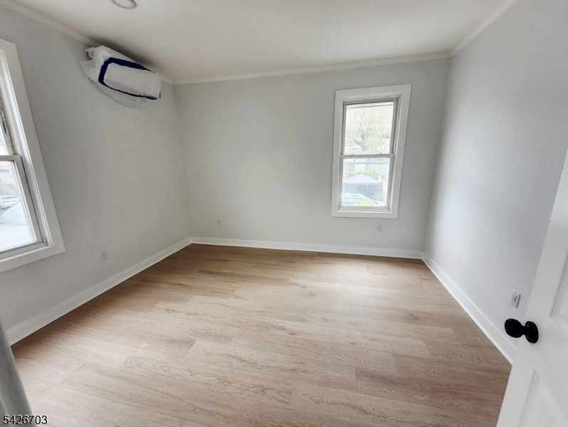 49 Union Place, Unit 3 Irvington, NJ 07111 - Photo 13 of 20 an empty room with windows