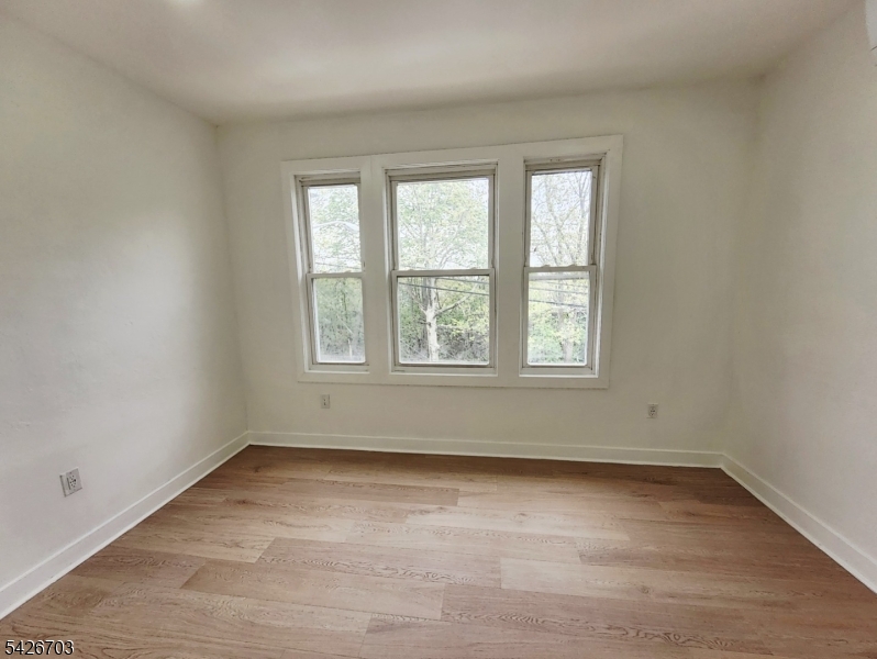 49 Union Place, Unit 3 Irvington, NJ 07111 - Photo 14 of 20 an empty room with a window