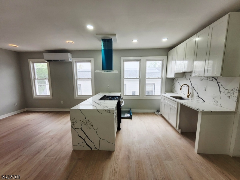 49 Union Place, Unit 3 Irvington, NJ 07111 - Photo 8 of 20 a kitchen with a sink appliances and cabinets