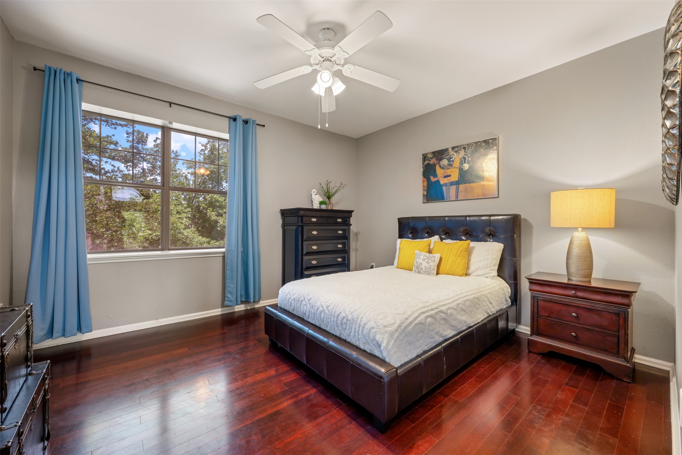 11203 Ranch Road 2222, Unit 1407 Austin, TX 78732 - Photo 30 of 40 The main floor also offers the spacious second bedroom, which comes with a walk-in closet and windows with tree filled views.