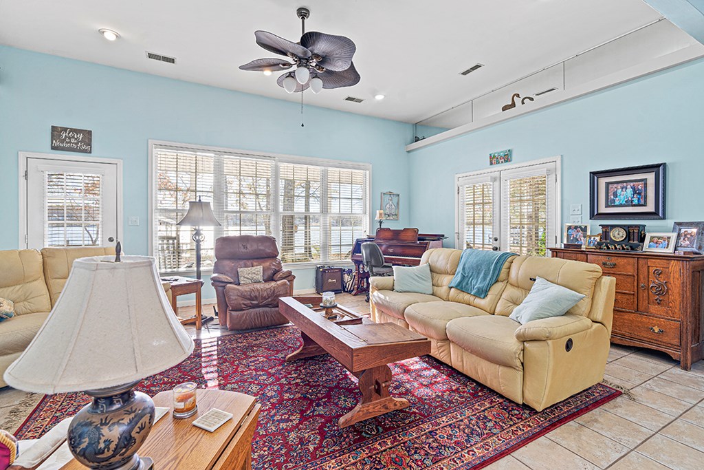 986 Ridgewood Harbor Road Waterloo, SC 29384 - Photo 6 of 43 a living room with furniture and a large window