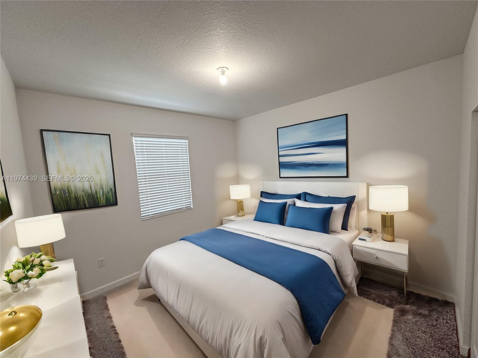 14804 Southwest 162nd Street Miami, FL 33177 - Photo 16 of 22 a bedroom with a bed and a lamp