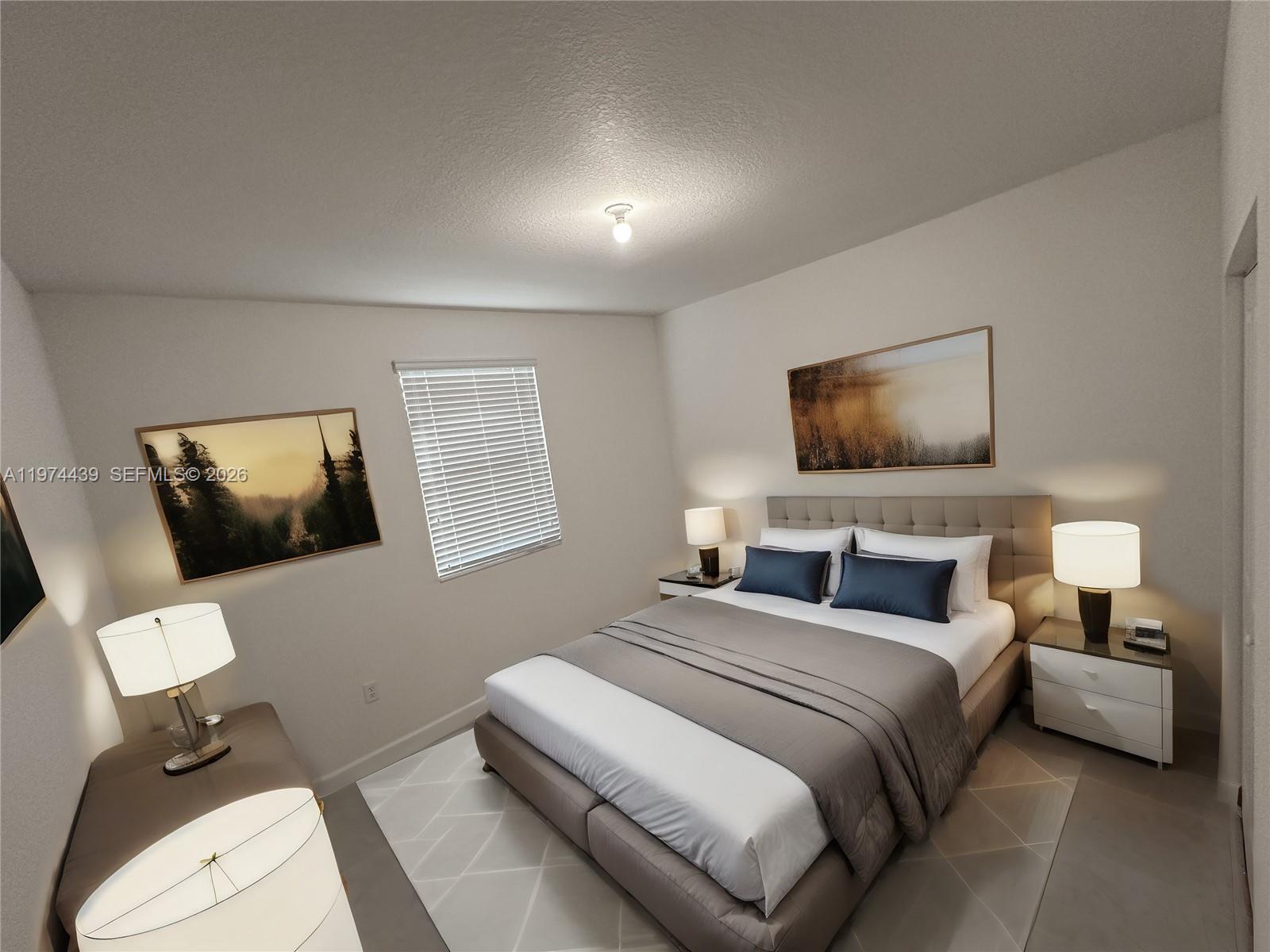 14804 Southwest 162nd Street Miami, FL 33177 - Photo 18 of 22 a bedroom with a bed and a flat screen tv