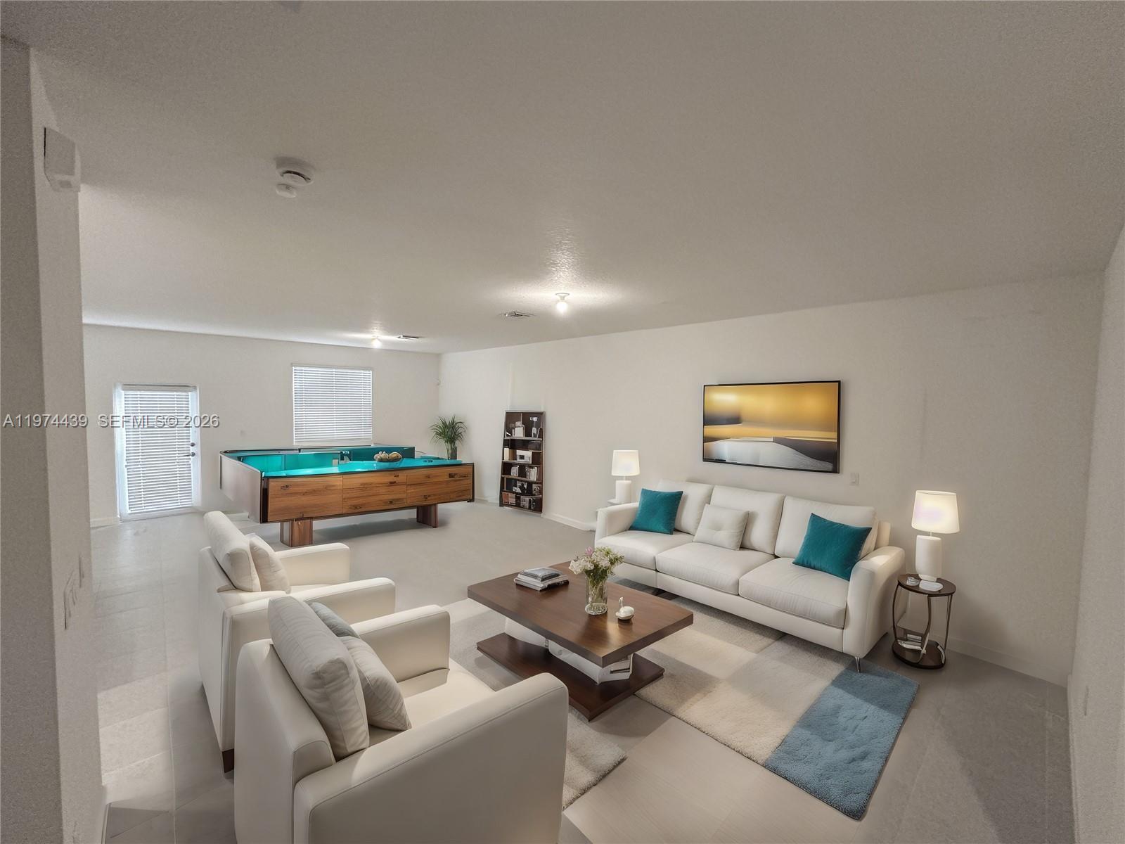 14804 Southwest 162nd Street Miami, FL 33177 - Photo 8 of 22 a living room with furniture and a table