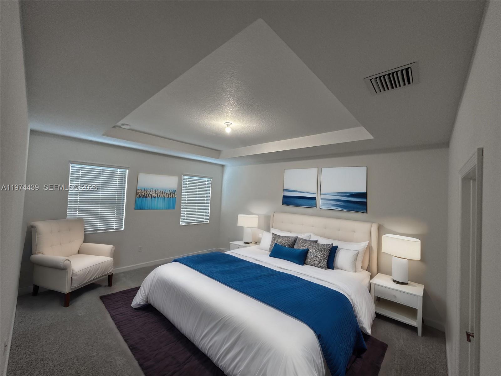 14804 Southwest 162nd Street Miami, FL 33177 - Photo 9 of 22 a bedroom with bed and a couch