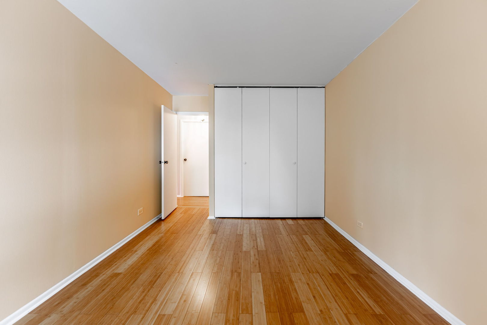 701 Forum Square, Unit 101 Glenview, IL 60025 - Photo 18 of 42 a view of a room with wooden floor