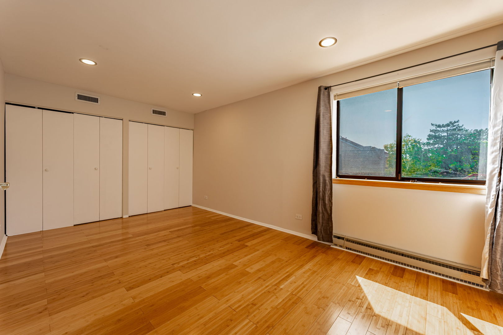 701 Forum Square, Unit 101 Glenview, IL 60025 - Photo 20 of 42 a view of an empty room with a window