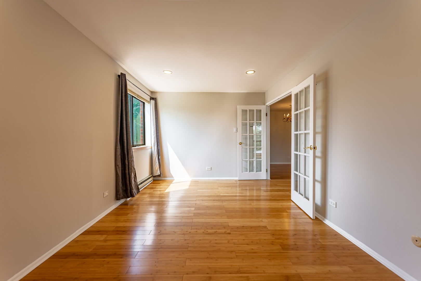 701 Forum Square, Unit 101 Glenview, IL 60025 - Photo 21 of 42 a view of livingroom with hardwood