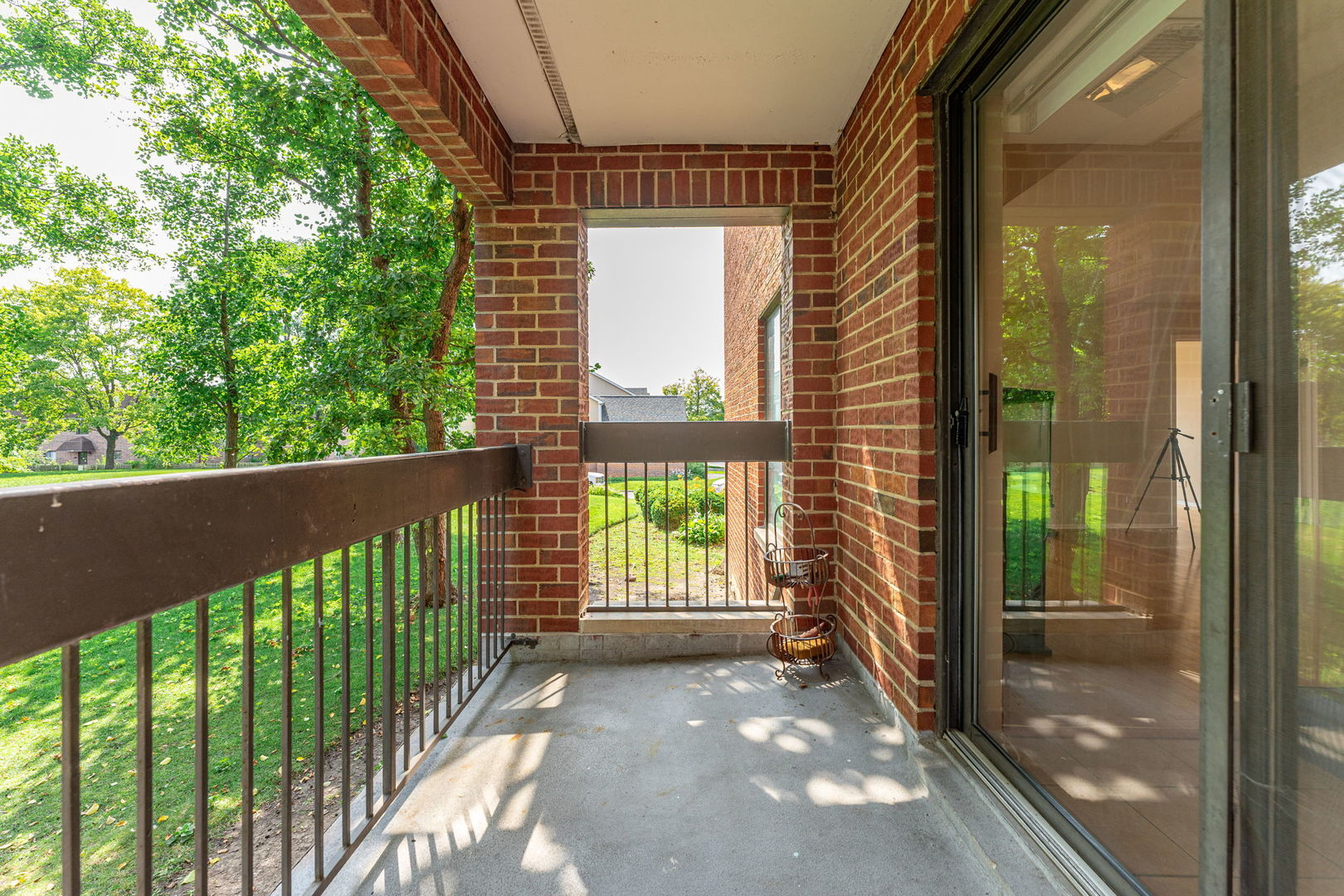 701 Forum Square, Unit 101 Glenview, IL 60025 - Photo 23 of 42 a view of a balcony with an outdoor space