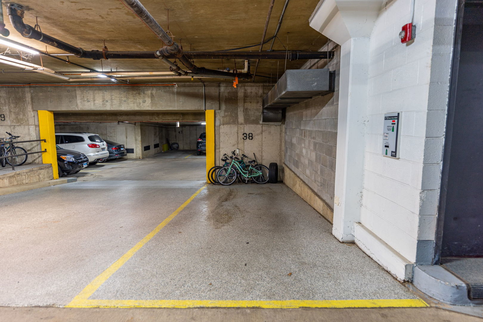 701 Forum Square, Unit 101 Glenview, IL 60025 - Photo 28 of 42 a view of parking garage with cars