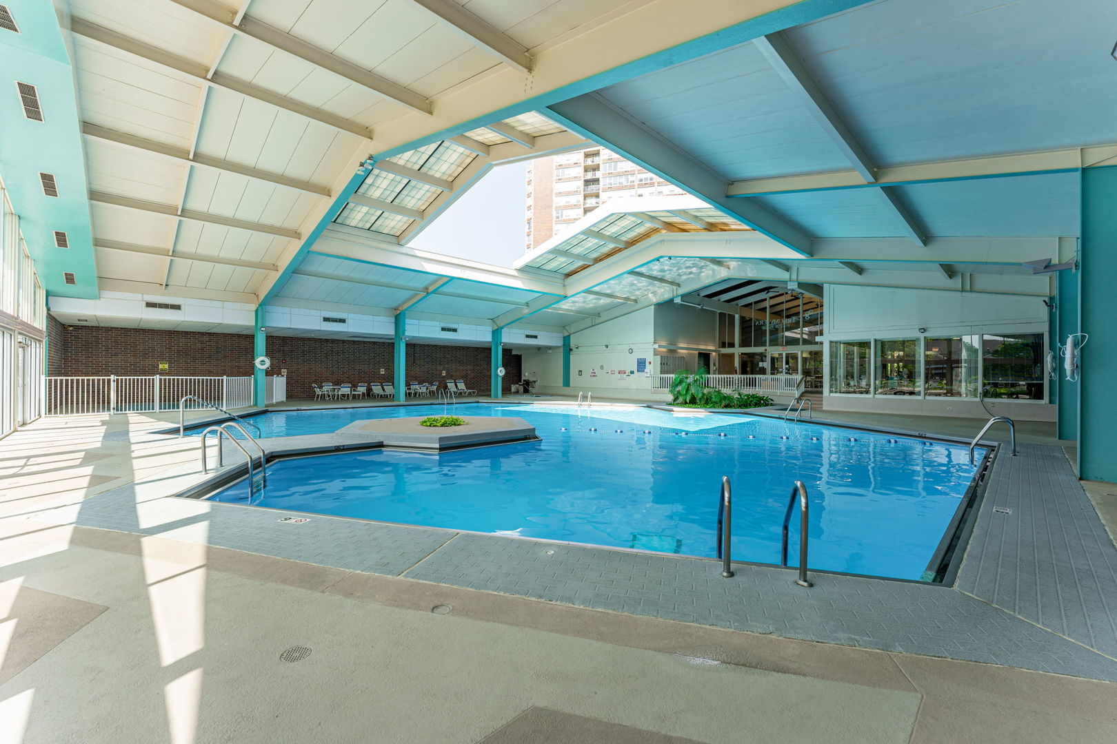 701 Forum Square, Unit 101 Glenview, IL 60025 - Photo 38 of 42 a view of a house with a swimming pool