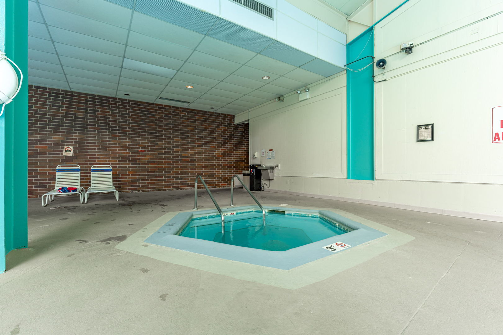 701 Forum Square, Unit 101 Glenview, IL 60025 - Photo 39 of 42 a room with pool table and a chandelier