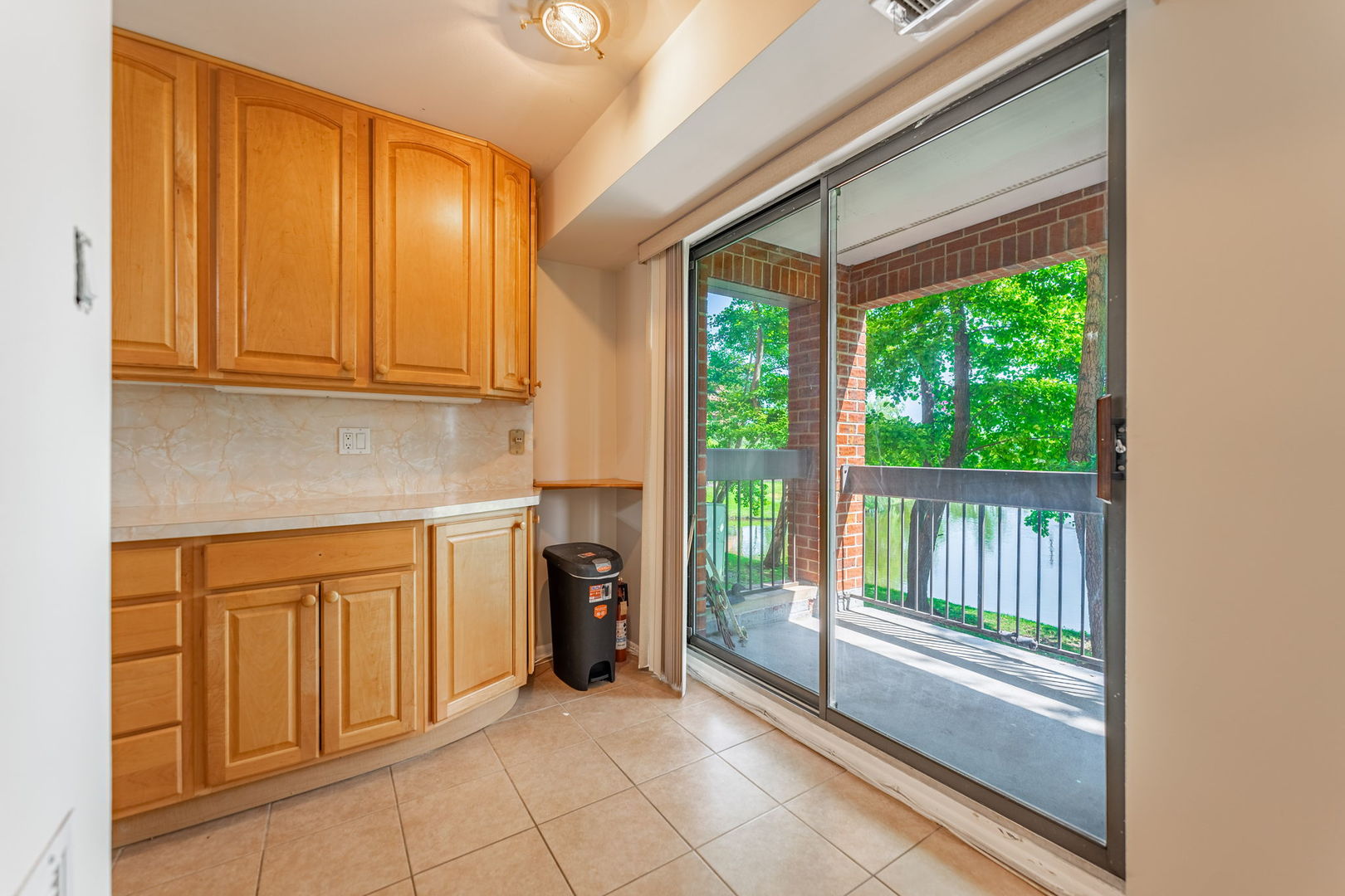 701 Forum Square, Unit 101 Glenview, IL 60025 - Photo 8 of 42 a view of a kitchen with furniture and staircase
