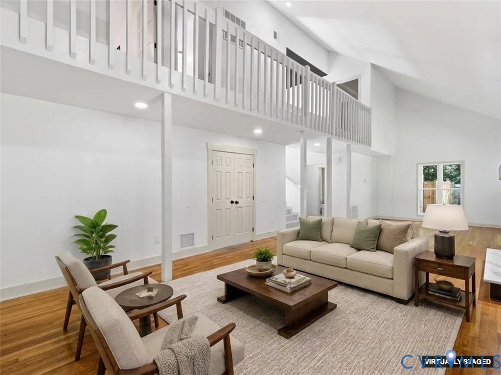 4113 Poplar Grove Road Midlothian, VA 23112 - Photo 9 of 34 Spacious living area featuring a vaulted ceiling,