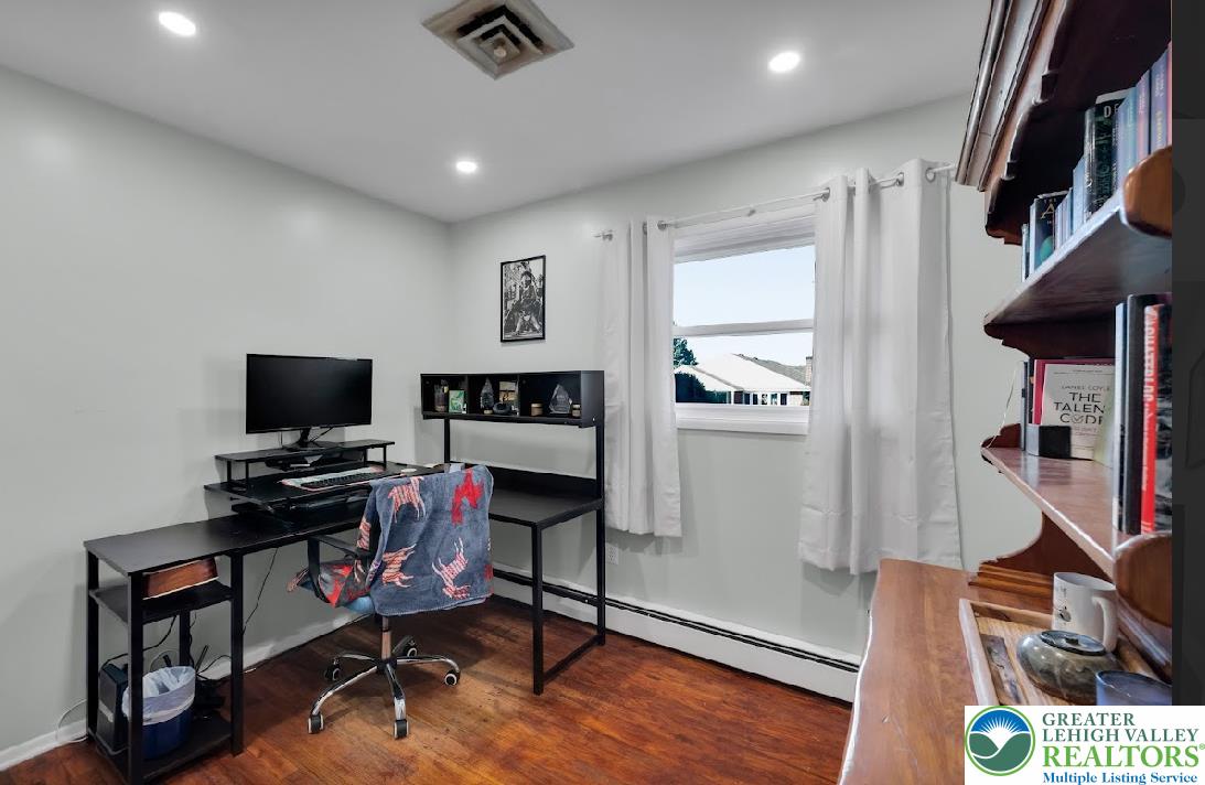 856 Poplar Road Hellertown, PA 18055 - Photo 12 of 19 a view of a workspace with furniture and a window