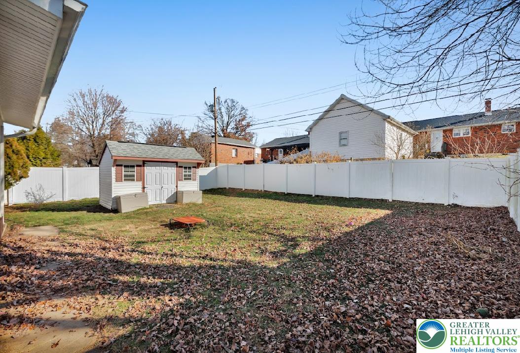 856 Poplar Road Hellertown, PA 18055 - Photo 19 of 19 a view of a house with a yard