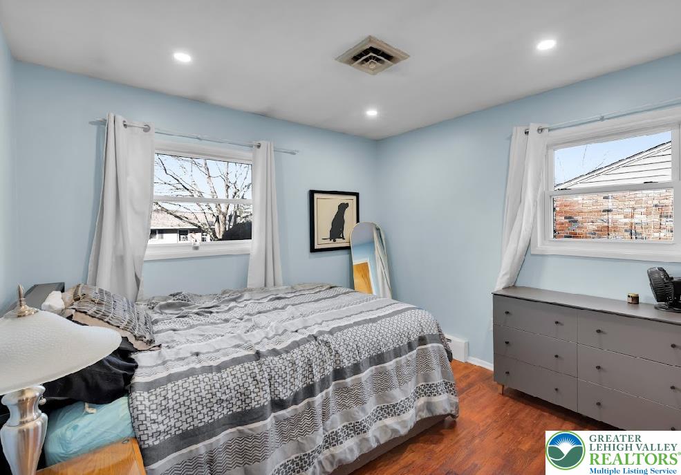 856 Poplar Road Hellertown, PA 18055 - Photo 10 of 19 a bedroom with a bed and a dresser