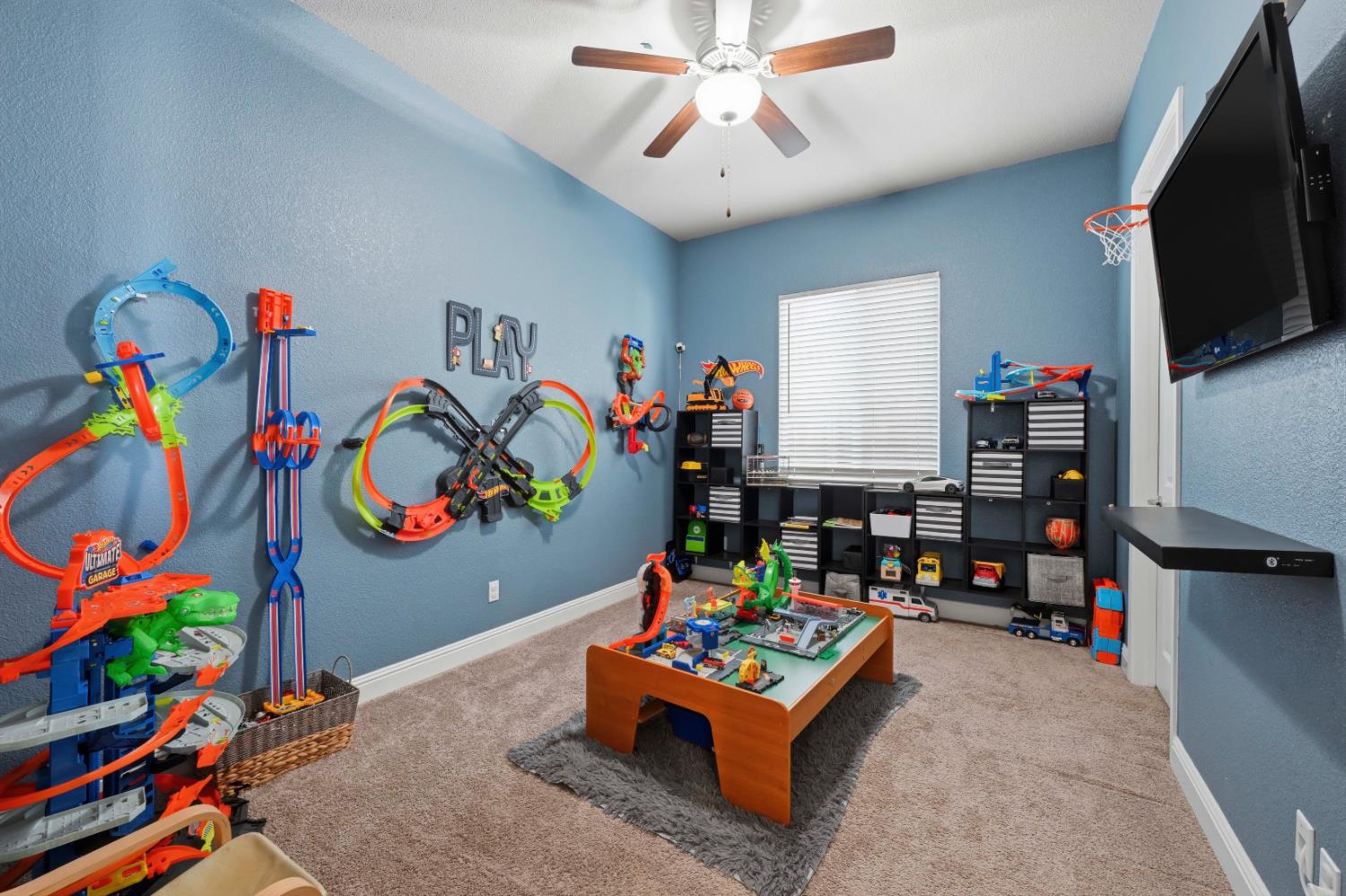 2012 Van Ruiten Drive Lodi, CA 95242 - Photo 20 of 49 a room with furniture and a flat screen tv