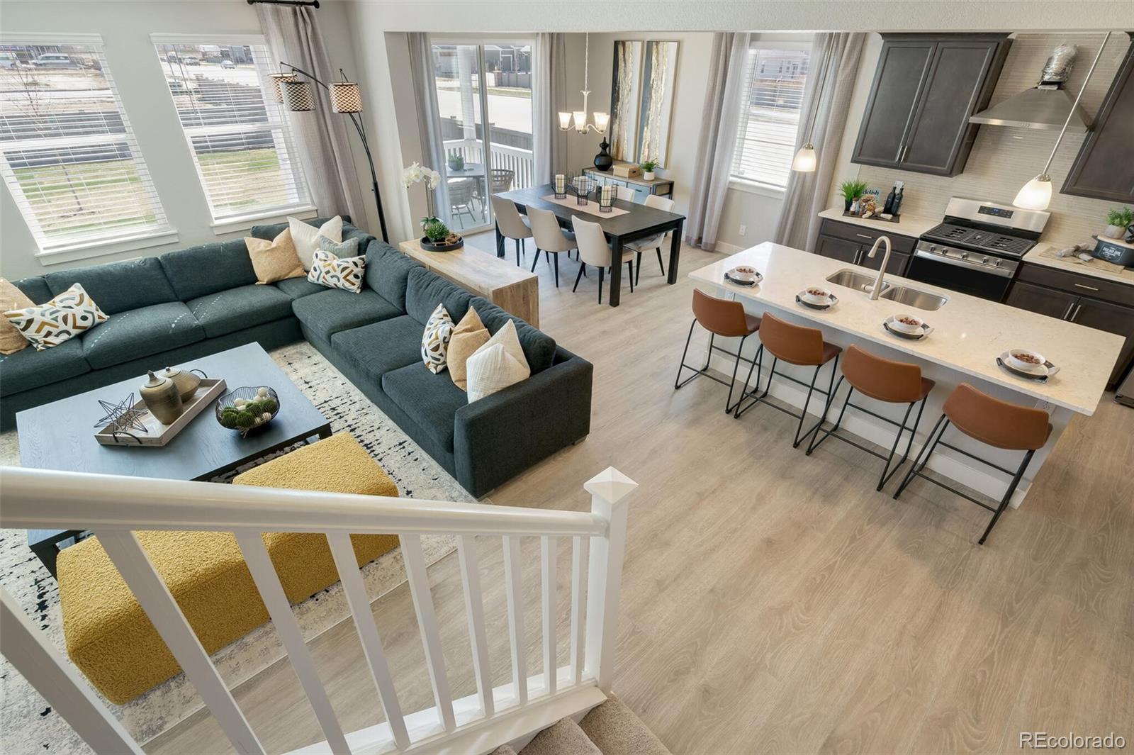 1908 Chaffee Crest Drive Berthoud, CO 80513 - Photo 18 of 39 a living room with furniture and a wooden floor