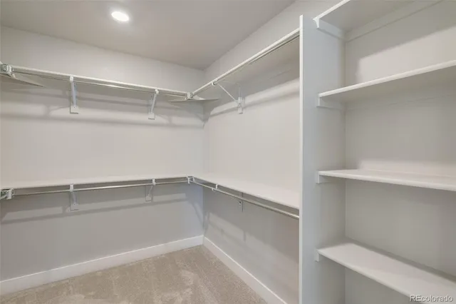 a view of an empty walk in closet