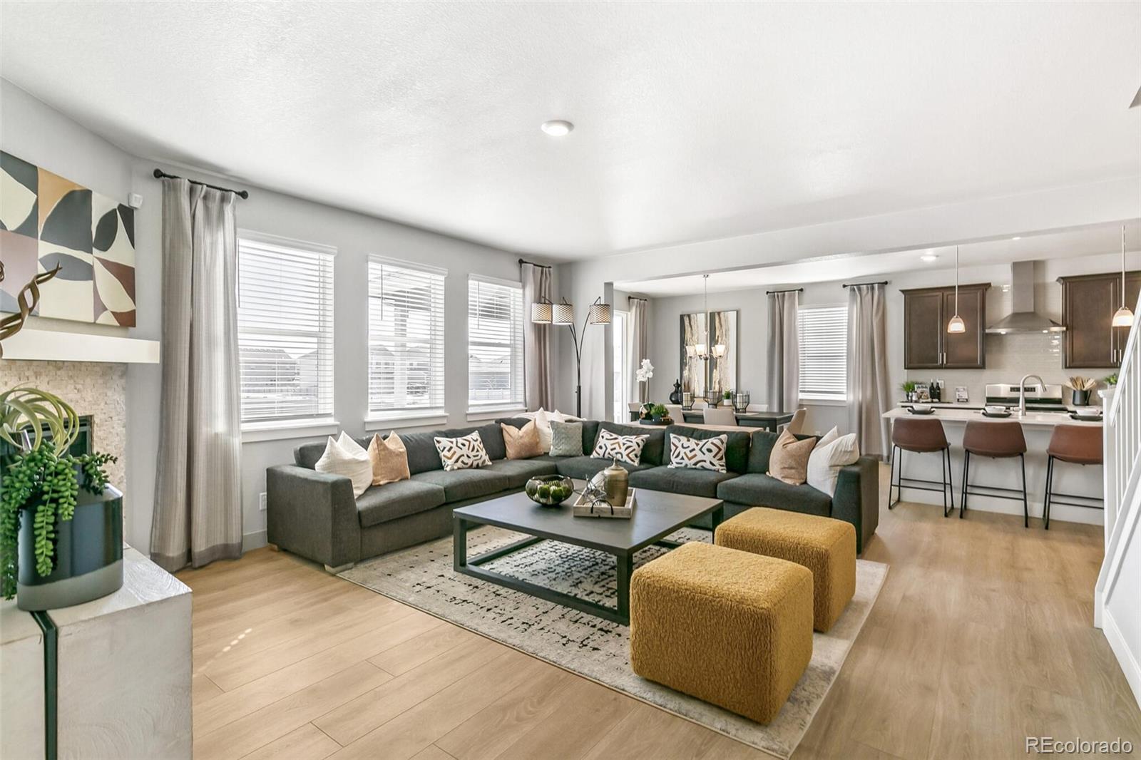 1908 Chaffee Crest Drive Berthoud, CO 80513 - Photo 6 of 39 a living room with furniture and a large window