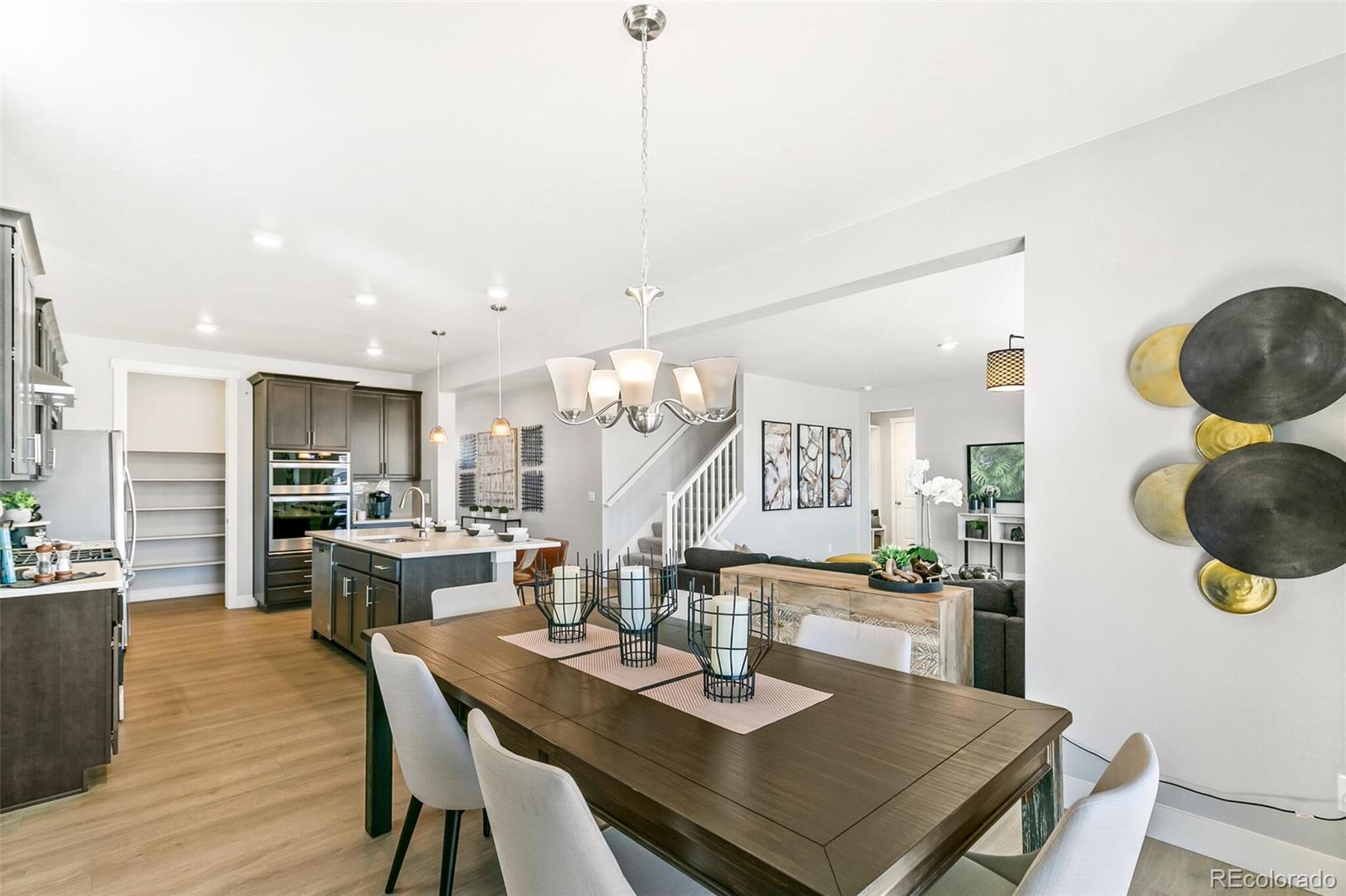 1908 Chaffee Crest Drive Berthoud, CO 80513 - Photo 9 of 39 a view of a dining room and livingroom