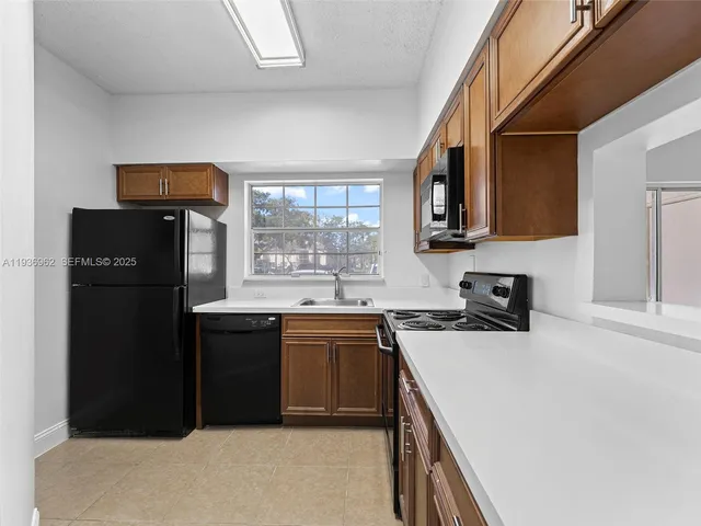 $220,000 | 720 Cypress Lane, Unit F9, Deerfield Beach, FL 33064