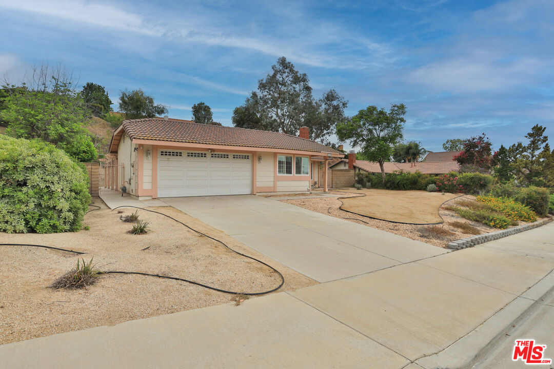 6811 Wilding Place Riverside, CA 92506 - Photo 3 of 42 a view of a house with a outdoor space