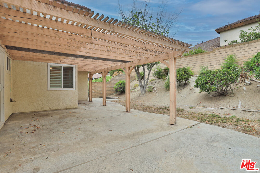 6811 Wilding Place Riverside, CA 92506 - Photo 31 of 42 a view of a house with a patio