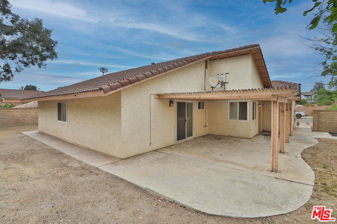6811 Wilding Place Riverside, CA 92506 - Photo 32 of 42 a view of a house with a backyard