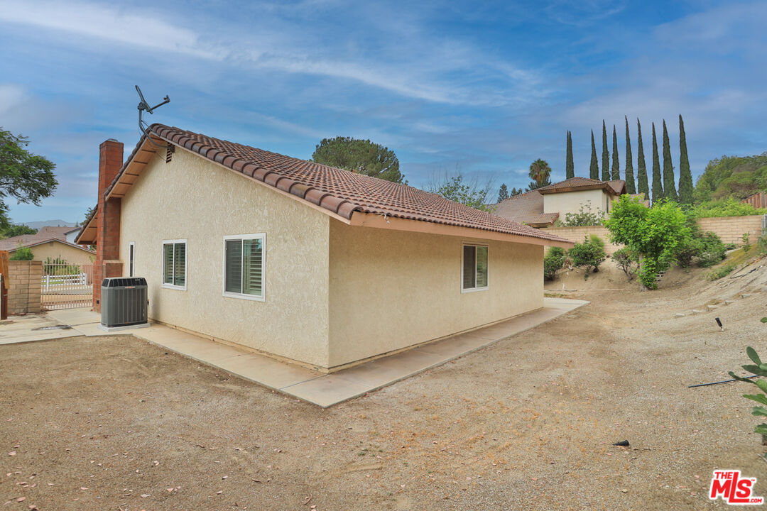 6811 Wilding Place Riverside, CA 92506 - Photo 34 of 42 a view of a house with a garage