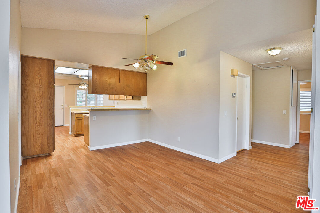 6811 Wilding Place Riverside, CA 92506 - Photo 7 of 42 a view of a kitchen from the hallway