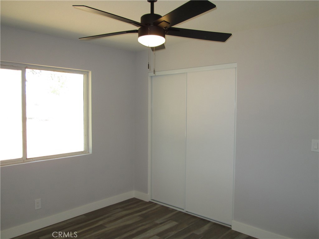 13464 Mohawk Road Apple Valley, CA 92308 - Photo 20 of 35 an empty room with a window