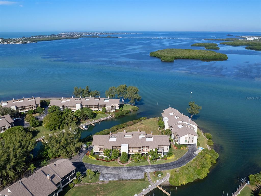 a aerial view of a house with a ocean view