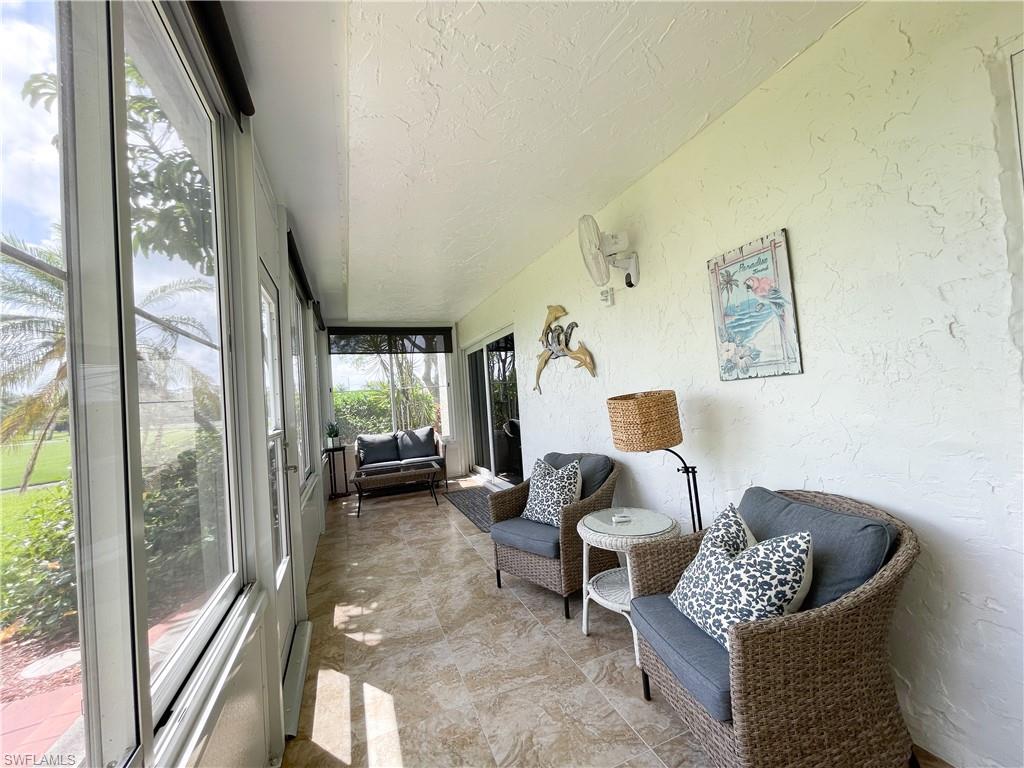 189 Harrison Road, Unit 111 Naples, FL 34112 - Photo 16 of 29 Relax and entertain on the spacious lanai