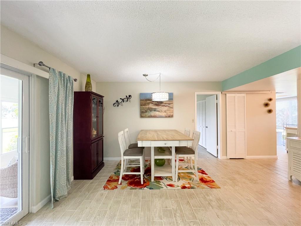 189 Harrison Road, Unit 111 Naples, FL 34112 - Photo 5 of 29 Tile flooring throughout