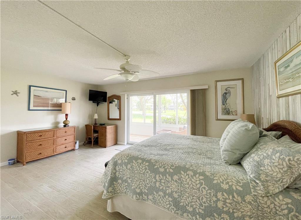 189 Harrison Road, Unit 111 Naples, FL 34112 - Photo 8 of 29 Plank tile floors throughout