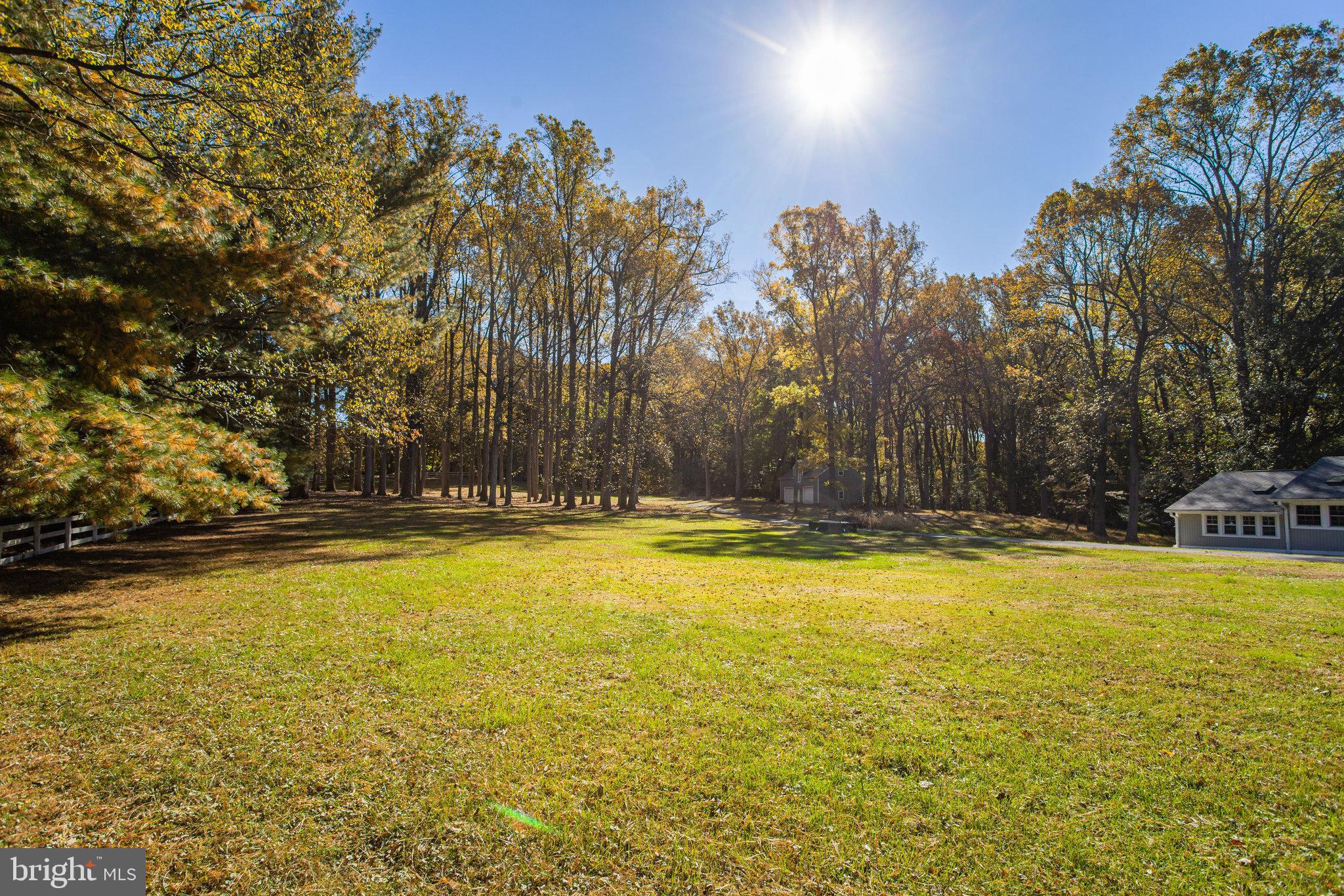 7601 Brickyard Road Potomac, MD 20854 - Photo 15 of 15 a view of a swimming pool and an outdoor space