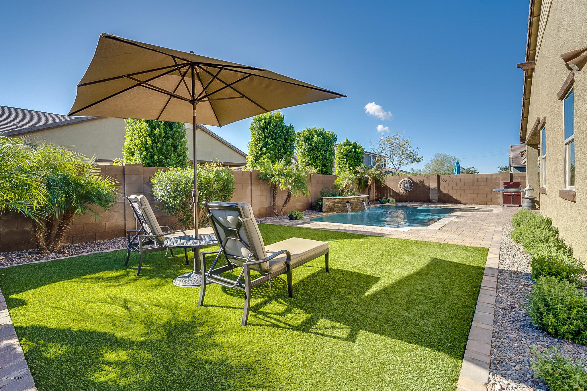 4089 East Weather Vane Road Gilbert, AZ 85296 - Photo 2 of 57 Pool and turf grass