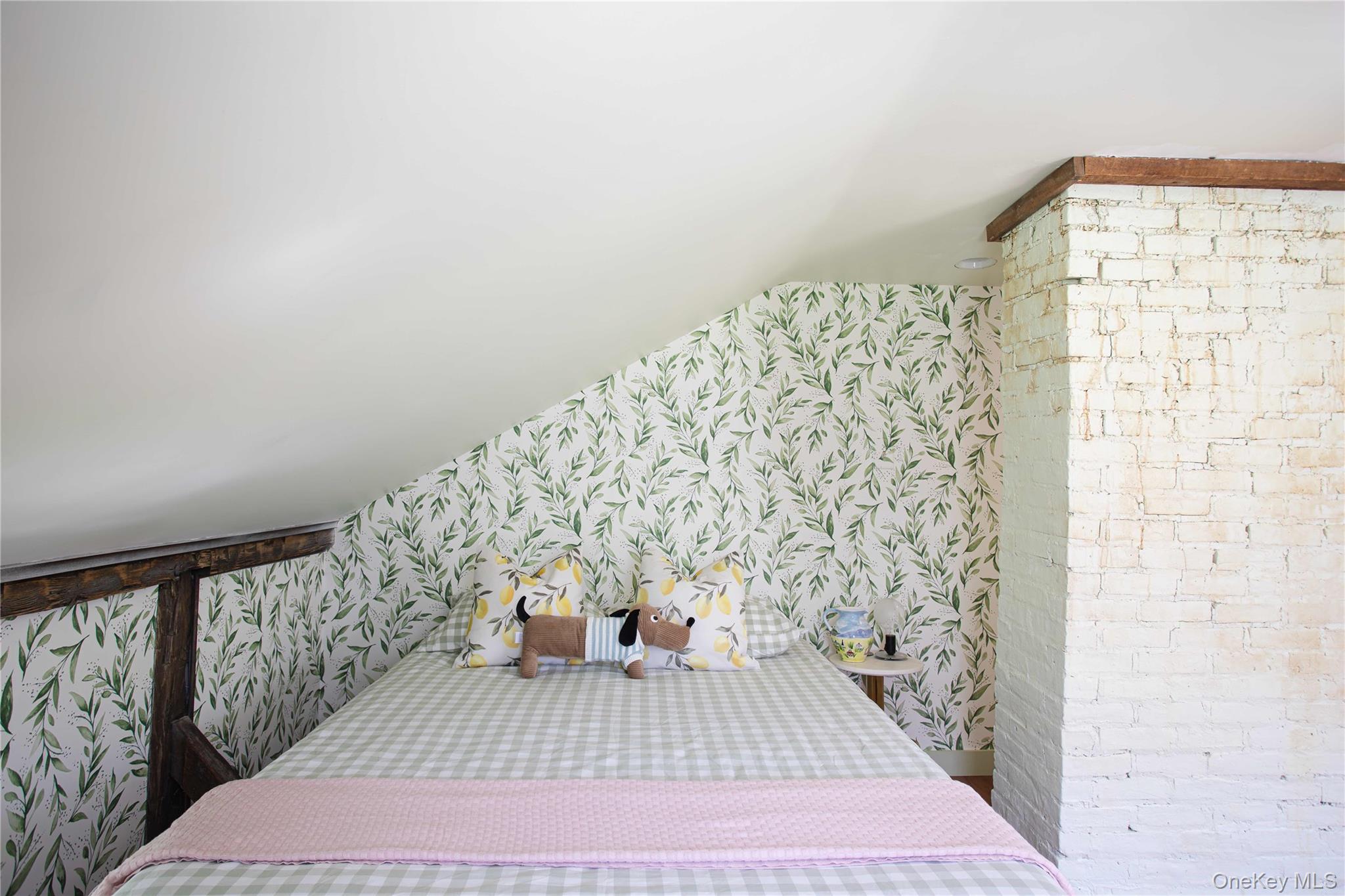 210 Middle Road Hudson, NY 12534 - Photo 36 of 42 Bedroom featuring an angled ceiling and exposed wooden structural beams